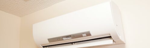 A wall-mount mini-split heating and air conditioning unit installed in a home