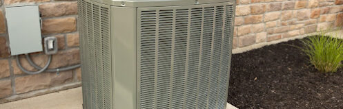 Outdoor unit of a high efficiency air conditioner or heat pump.